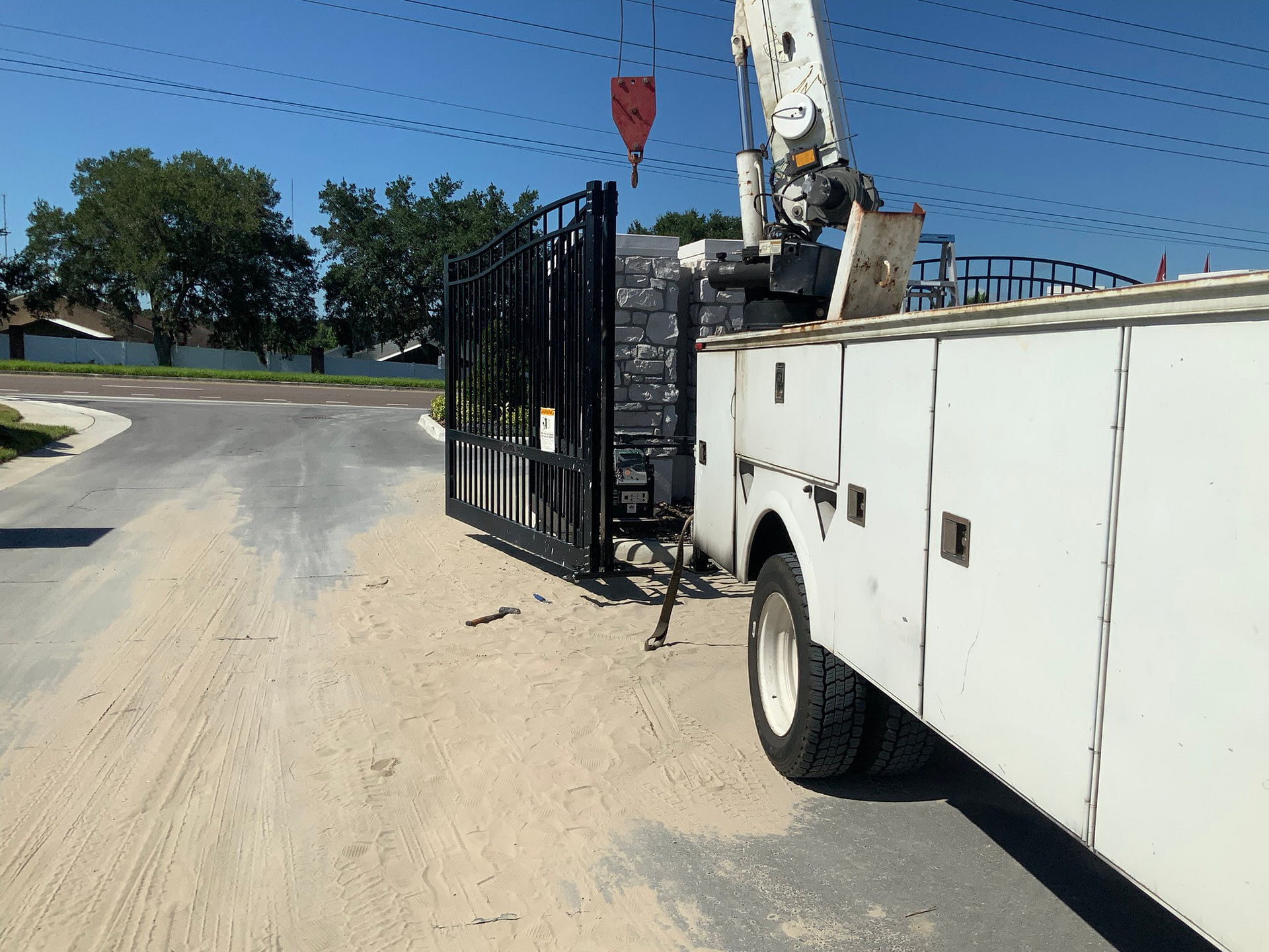 Folding Gates Lakeland Gate Tech Inc. Custom Driveway Gates